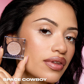 URBAN DECAY Moondust Eyeshadow Space Cowboy on makeup vanity
