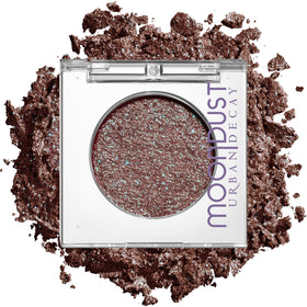 URBAN DECAY Moondust Red Eyeshadow front view with green sparkle