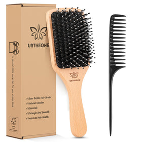 URTHEONE Boar Bristle Hair Brush on a bathroom counter