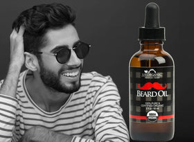 US Organic Beard Oil with dropper in hand