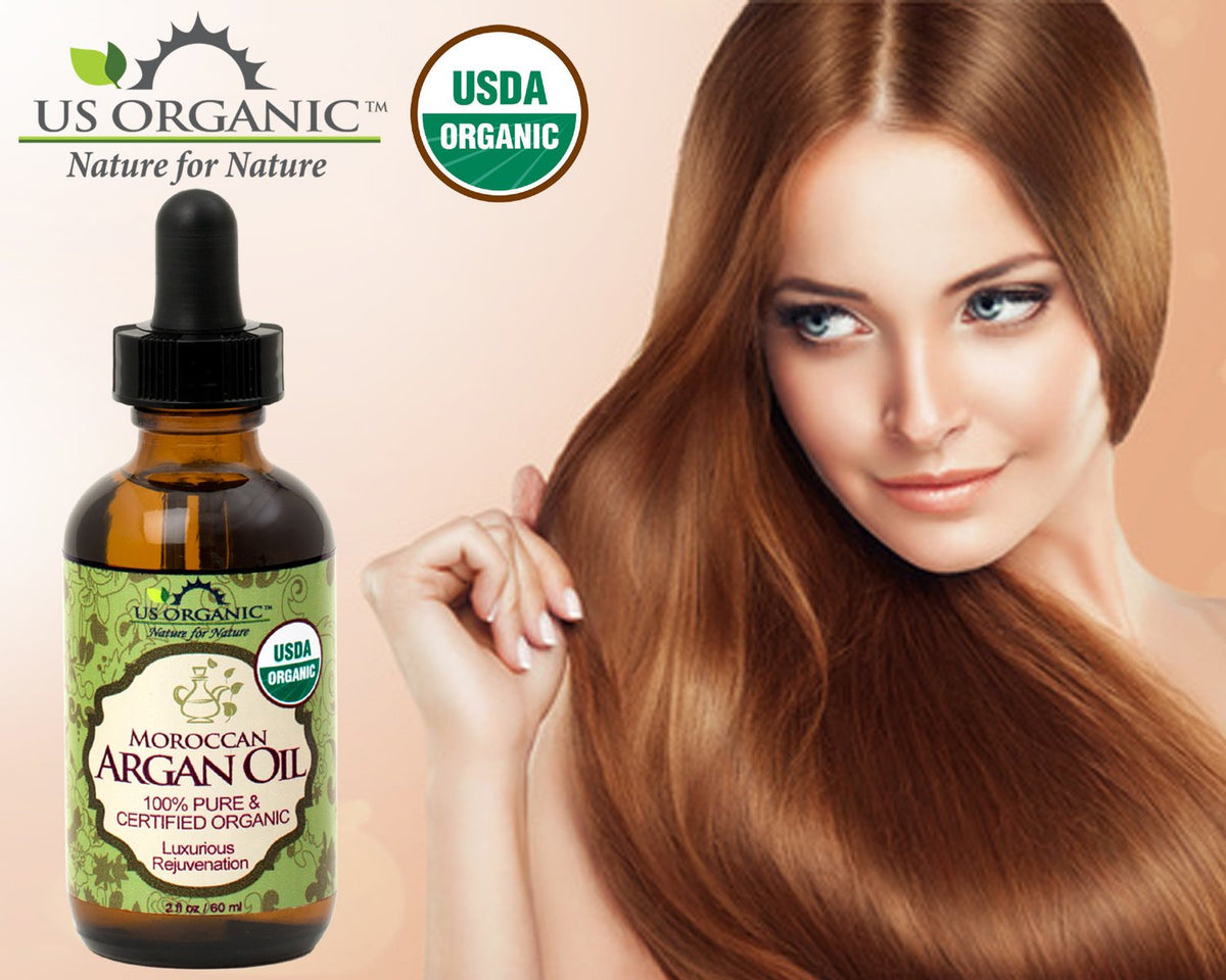 US Organic Moroccan Argan Oil 2 Oz on a wooden surface