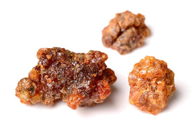 US Organic Myrrh and Frankincense essential oils with natural background