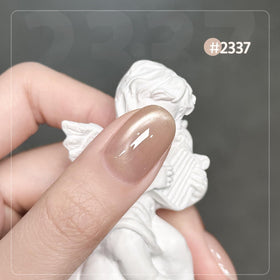 User applying GAOY Cat Eye Gel Nail Polish at home