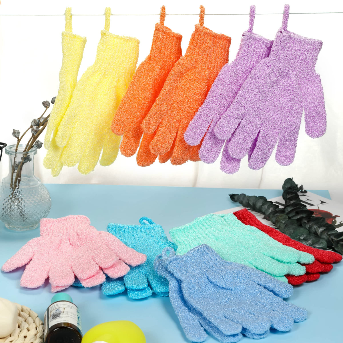User applying shower gel on CVNDKN Exfoliating Bath Gloves