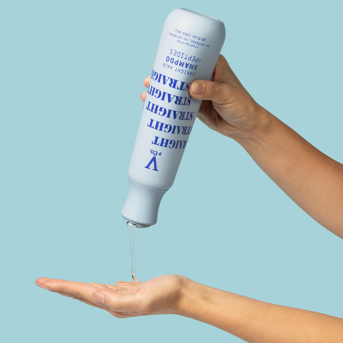 V&CO Straight Hair Moisturizing Shampoo 12 oz on a bathroom shelf