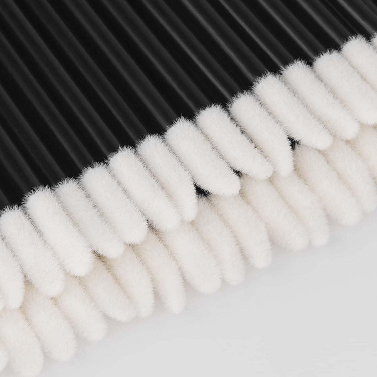 Vaincre lip wands being used for lip gloss application