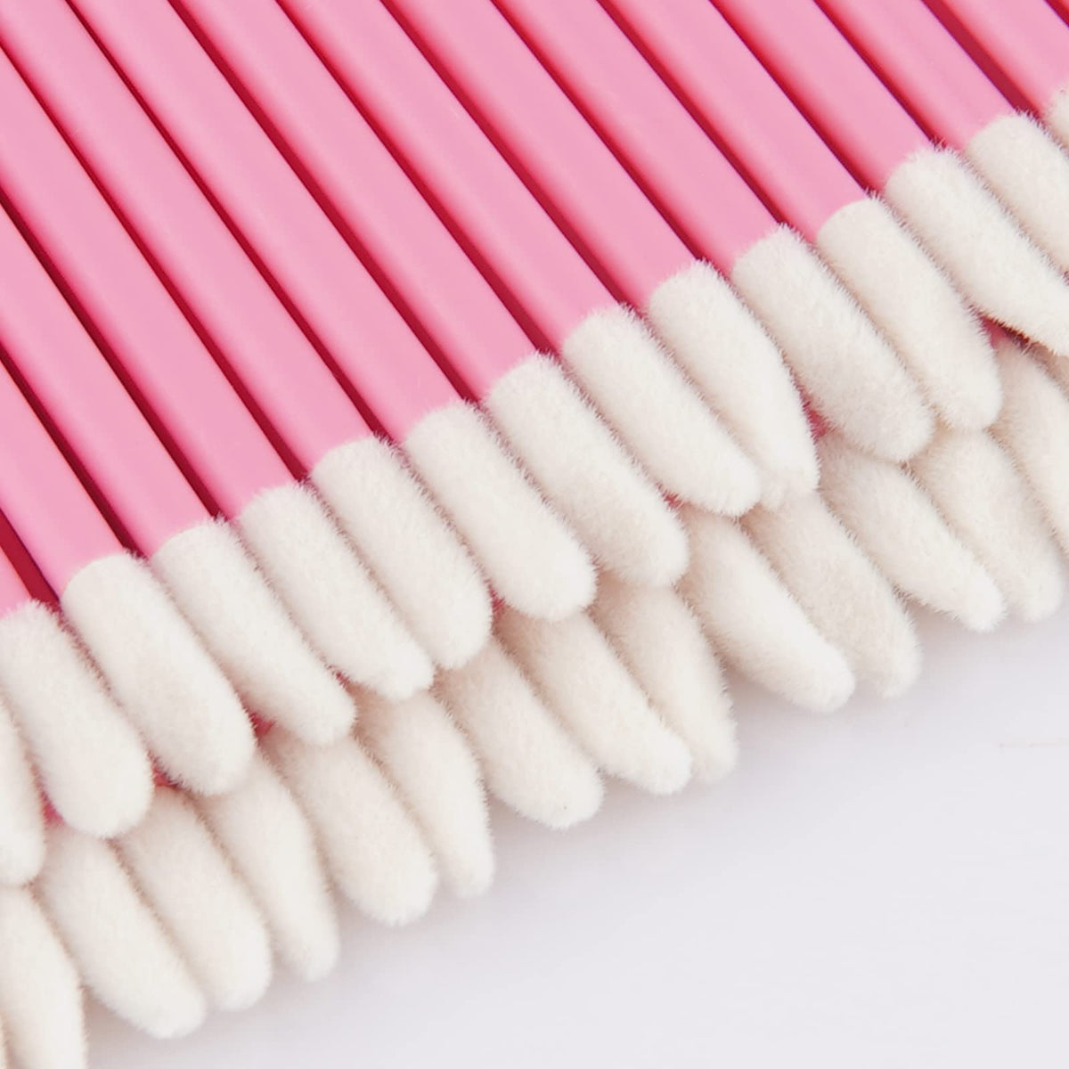 Vaincre lip wands in use applying lip gloss