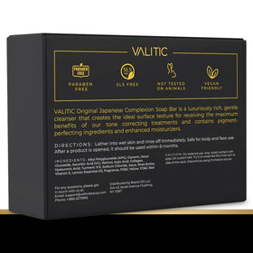 VALITIC soap with lemon and turmeric on a wooden surface