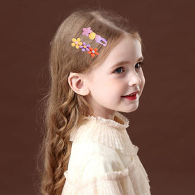 Variety of Ooosonlu hair clips displayed on a flat surface