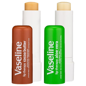 Vaseline Aloe Vera Lip Balm stick on a wooden surface