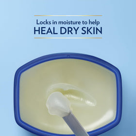 Vaseline Healing Jelly Original jar with a hand applying it