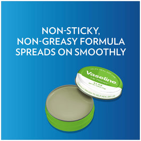 Vaseline Lip Therapy Aloe Vera Lip Balm Tin on a wooden surface