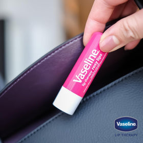 Vaseline Lip Therapy Care Rosy stick being applied to lips