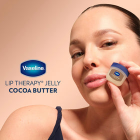 Vaseline Lip Therapy Cocoa Butter jar with chocolate background