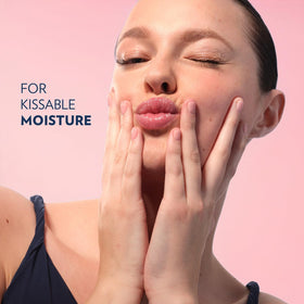 Vaseline Lip Therapy Rosy Lips Mini being applied