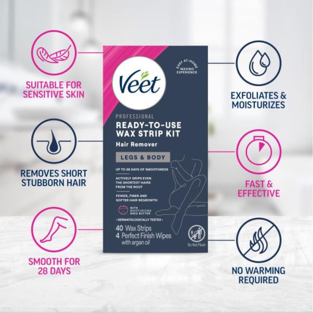 Veet wax strips in use on leg
