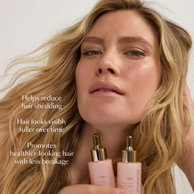 VEGAMOUR GRO Hair & Scalp Serum bottle with cap