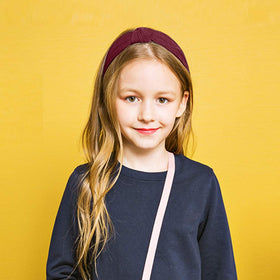 VELSCRUN headbands displayed in a stylish arrangement
