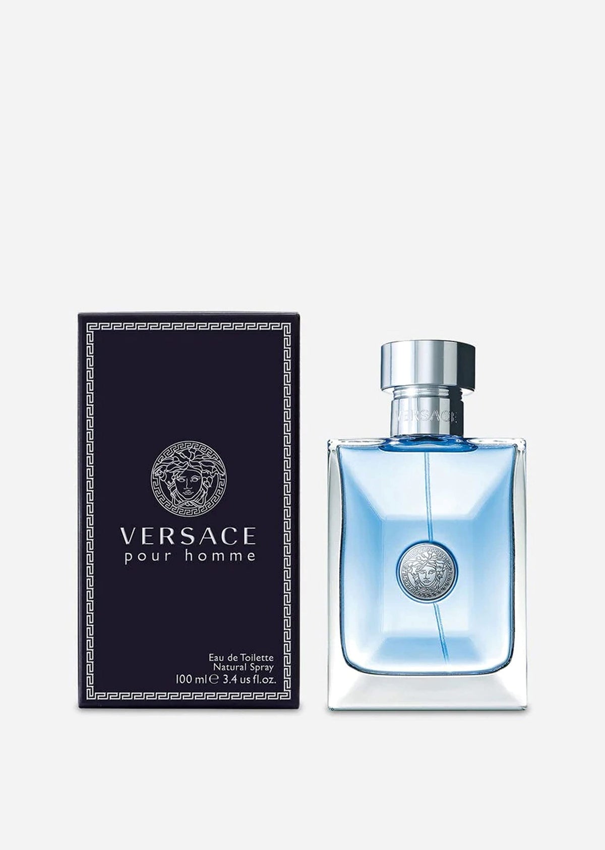 Versace Pour Homme Eau de Toilette Spray 3.4 oz on a dressing table