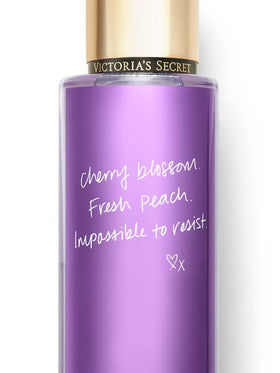 Victoria's Secret Love Spell Mist and Lotion Set on a vanity