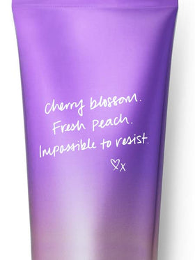 Victoria's Secret Love Spell Mist bottle with cherry blossoms