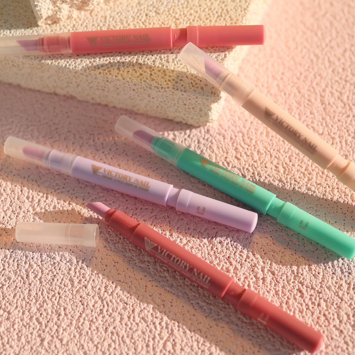 VICTORY NAIL Cuticle Oil Pen with close-up of cuticle care