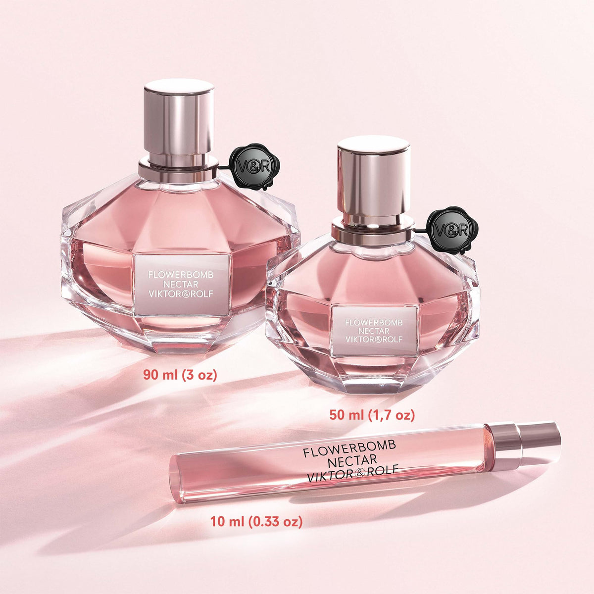 Viktor&Rolf Flowerbomb Nectar Eau de Parfum bottle with flowers
