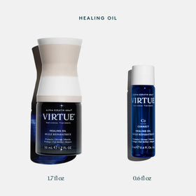 VIRTUE Healing Oil 1.7 Fl Oz in hand with shake action