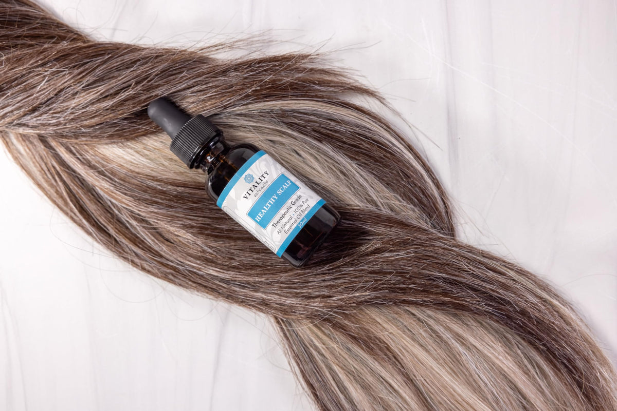Vitality Healthy Scalp Essential Oil Blend 30ml on a wooden table
