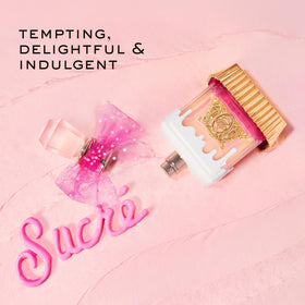 Viva La Juicy Sucré Eau de Parfum Travel Spray Pen in lifestyle setting