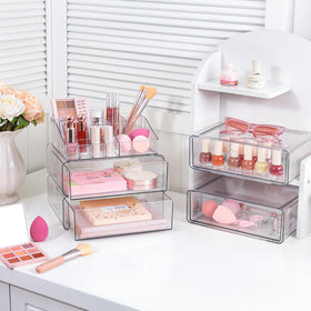 Vtopmart 5 Tier Clear Makeup Organizer with drawer open showing products