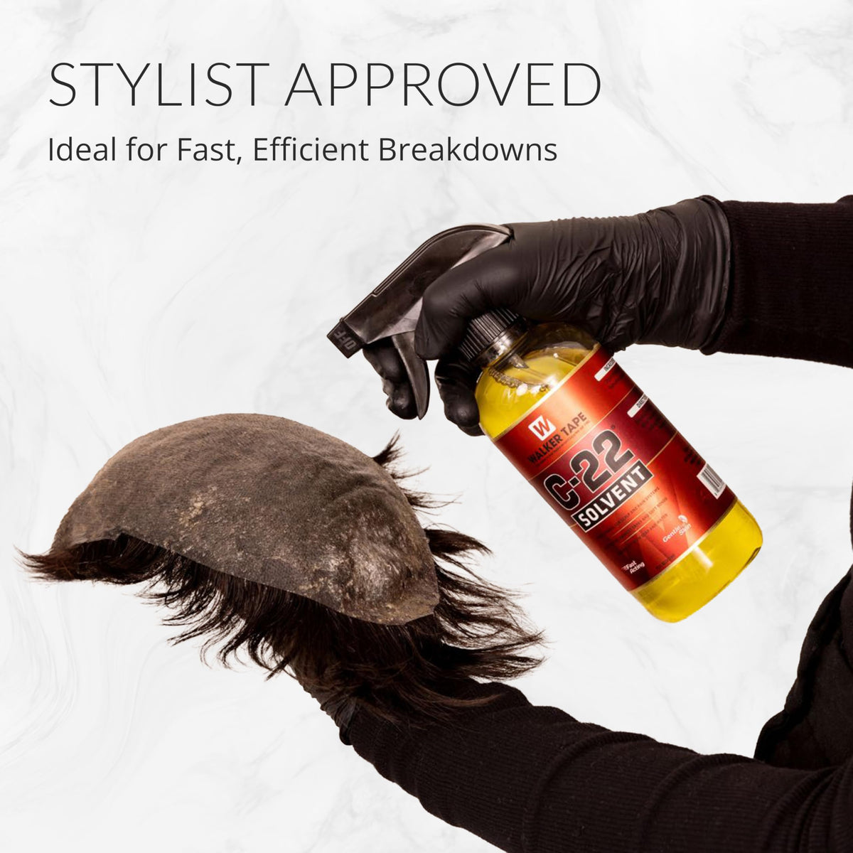 Walker Tape C-22 Adhesive Solvent Spray 12 oz lifestyle scene with hair extensions