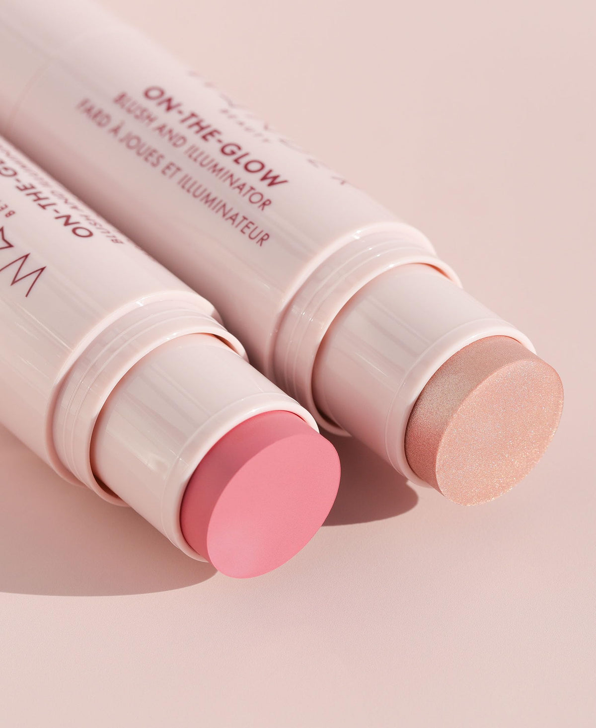 Wander Beauty On-the-Glow Blush and Illuminator stick showing both blush and highlighter