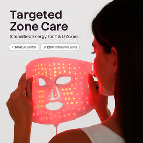 wavytalk Red Light Therapy Mask on a table with skincare products