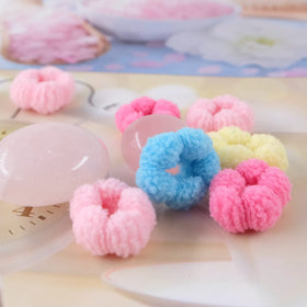 WDGROW Baby Hair Ties on a toddler's hair