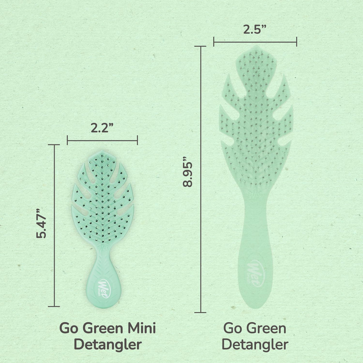 Wet Brush Go Green Mini Detangler being held in hand
