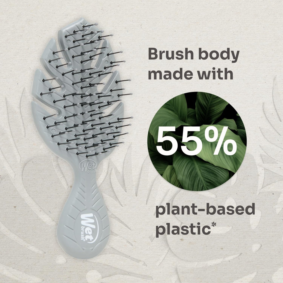Wet Brush Go Green Mini Detangler on a bathroom counter