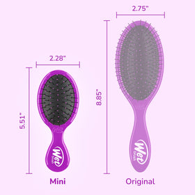 Wet Brush Mini Detangler being used on wet hair