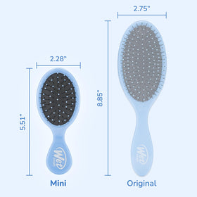 Wet Brush Mini Detangler in use on wet hair