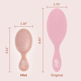 Wet Brush Mini Detangler in use on wet hair
