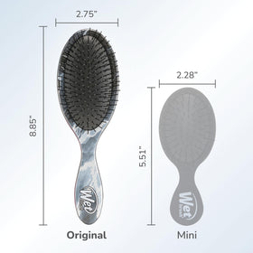 Wet Brush Original Detangler Brush on a bathroom counter