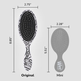 Wet Brush Original Detangler Hair Brush held in hand, showing flexible bristles