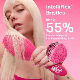 Wet Brush Original Detangler on a styling table