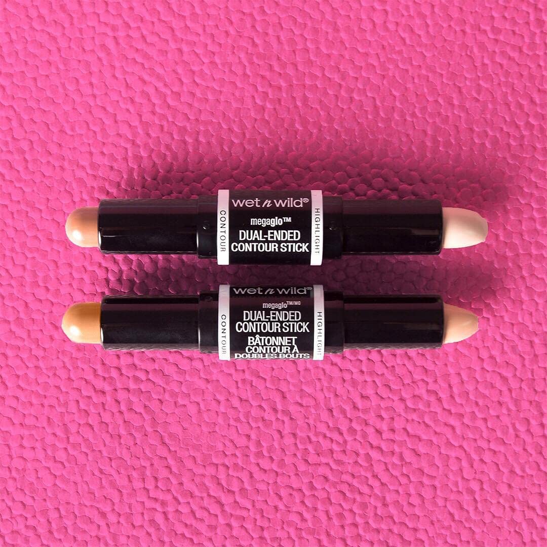 wet n wild MegaGlo Dual-Ended Contour Stick Light Medium on a makeup table