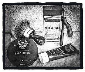 Wholly Kaw Unscented Shaving Soap on a wooden shelf