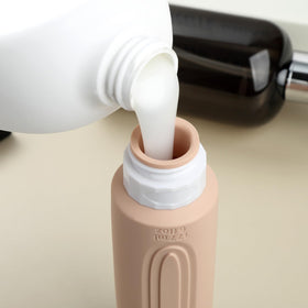Wide opening of Mrsdry travel bottle for easy filling
