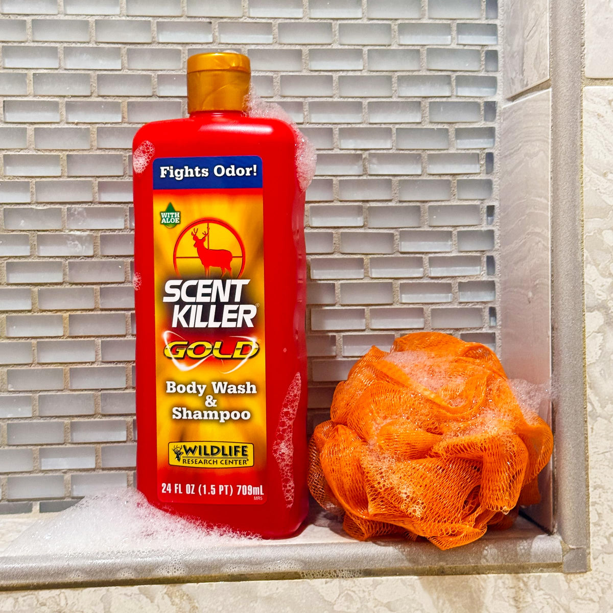 Wildlife Scent Killer Gold Body Wash and Shampoo on bathroom shelf
