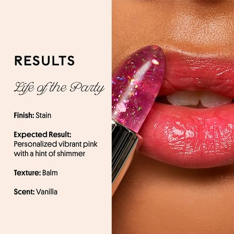 Winky Lux balms placed on a vanity with floral background