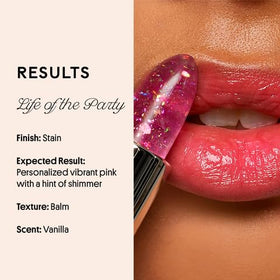 Winky Lux balms placed on a vanity with floral background