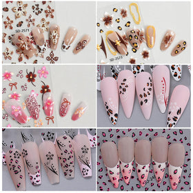 Woman applying nail stickers with tweezers